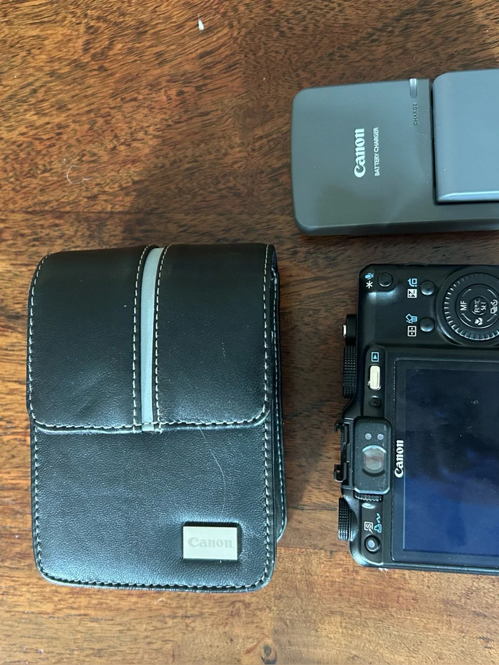 Canon PowerShot G9 Compact Digital Camera with Black Case and Gray Charger